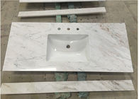 Las encimeras blancas de la piedra del mármol de Carrara pulieron/la otra superficie del final