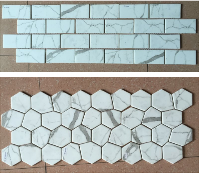 El hueso de pescados blanco de la teja de mosaico del mármol de Cararra